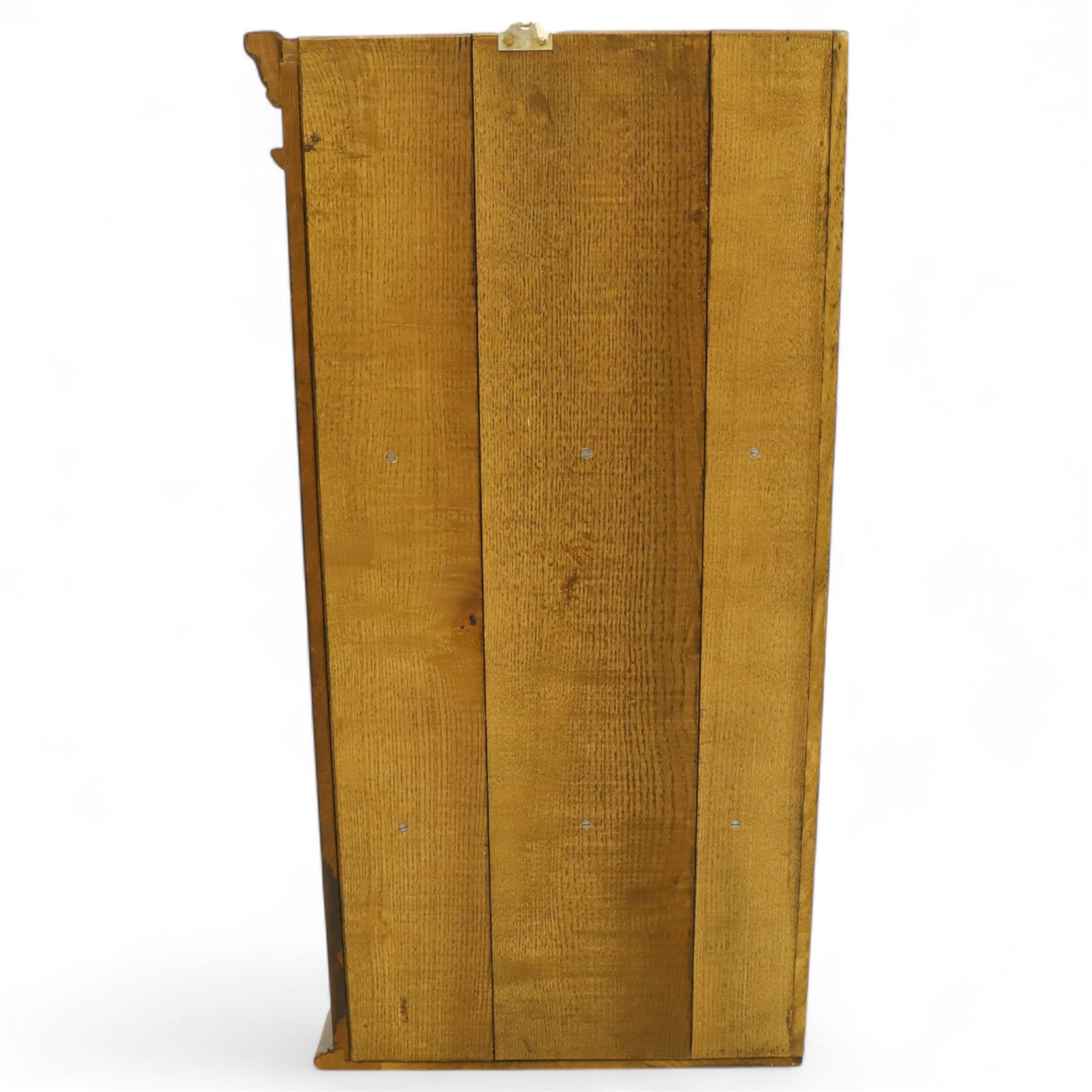 Early 20th century oak wall-mounted corner cabinet, moulded cornice above a single glazed door with six-panel astragal glazing, fitted interior with two shaped shelves