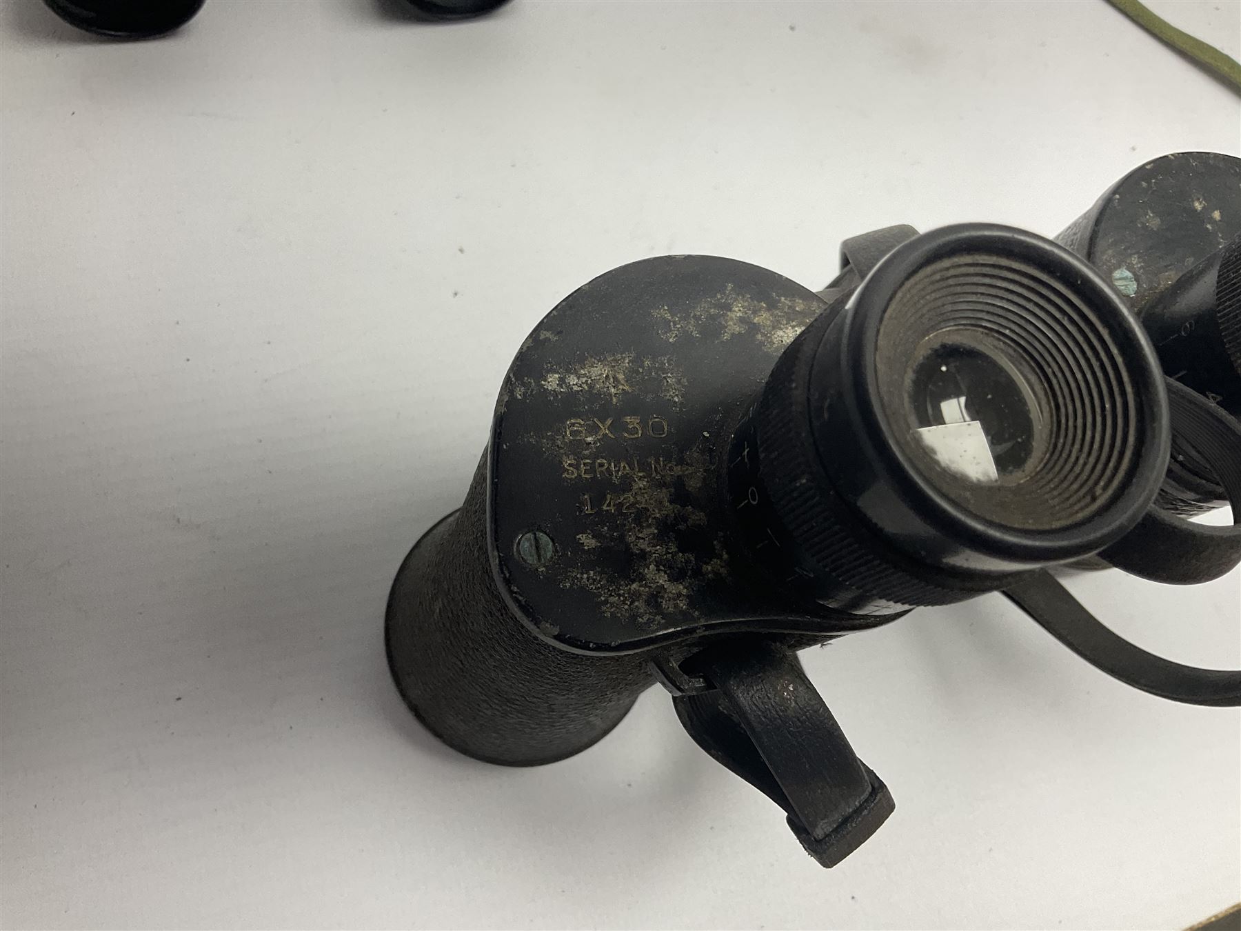 Pair of British World War Two issue black-painted binoculars, Bino 7x50 No. 5, 6E/320, No. 87412, MoD.B/42, with case, together with Nipole 10 x 50 binoculars and two other pairs