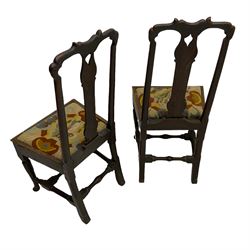 Pair of 18th century oak hall chairs, shaped crest and upper splats, upholstered drop in seats