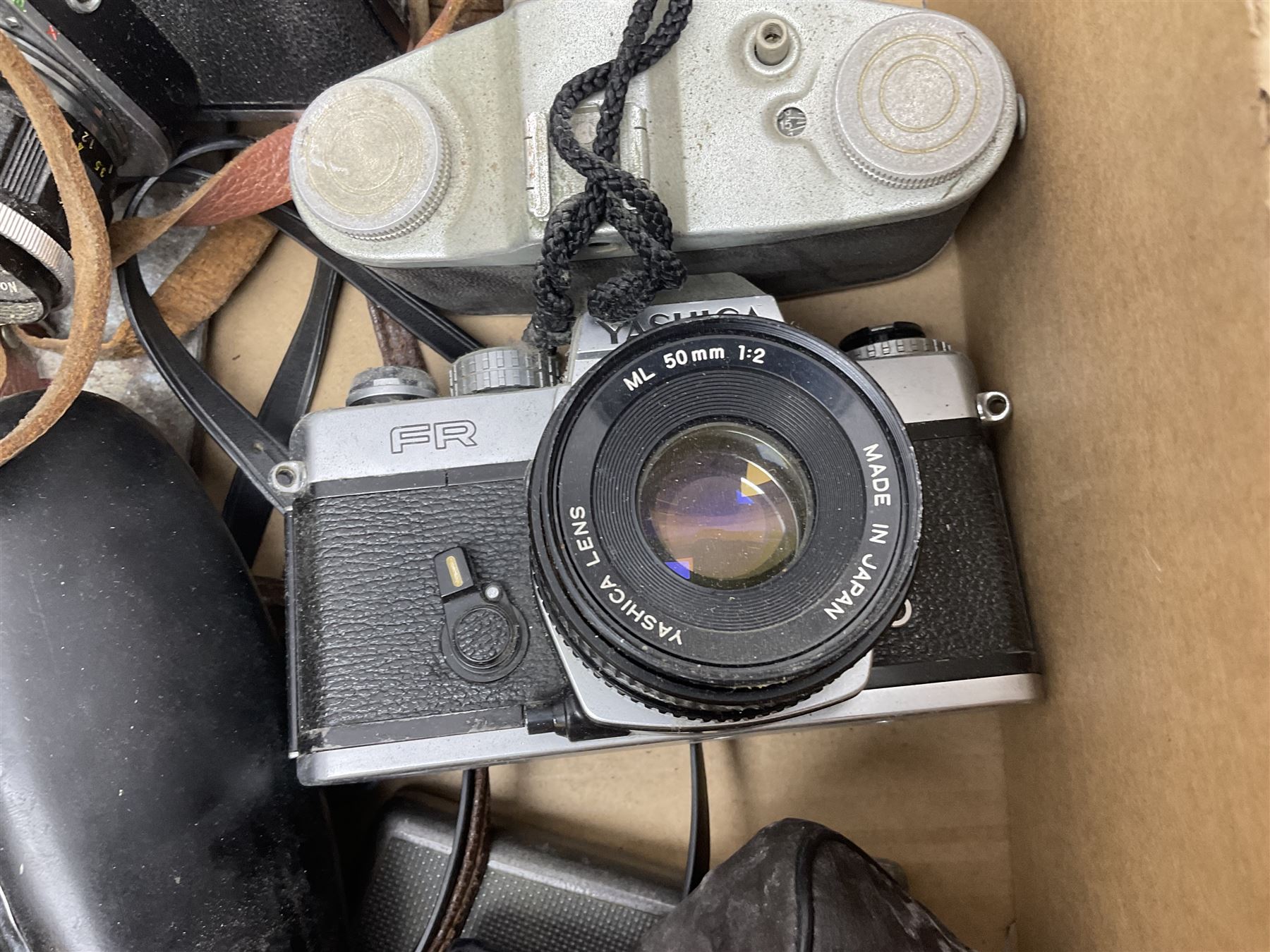 Large collection of cameras to include folding and SLR examples, including Rank Aldis, Agfa, Yashica, etc