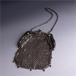Art Nouveau silver chainmail purse, the silver clasp embossed with poppies, hallmarked Ang...
