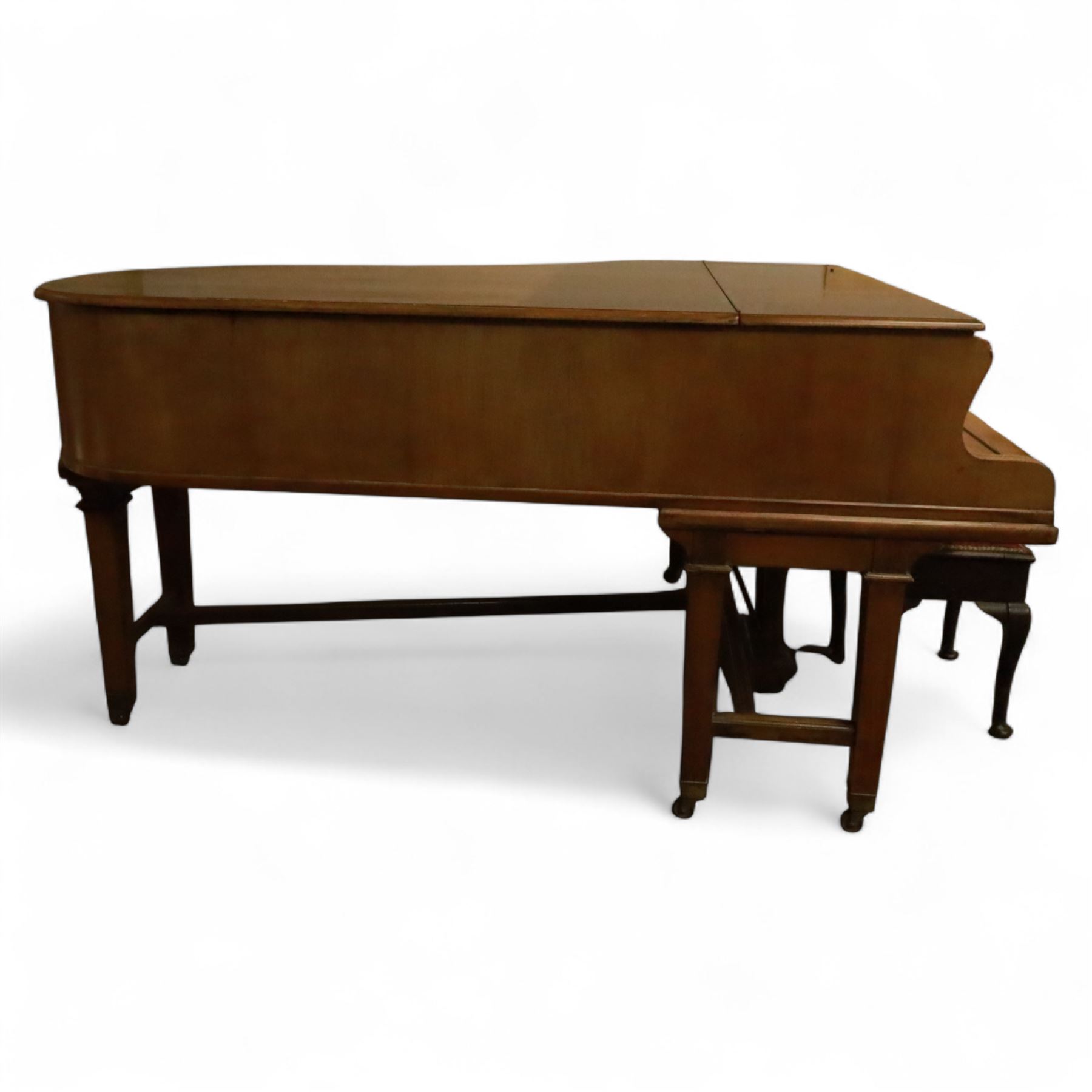 John Broadwood & Sons-20th century mahogany boudoir grand piano serial No 53529 (1920),  with twin square tapered legs and stretchers raised on brass castors, with an open fretted adjustable music desk and folding fallboard, conforming lyre with una-corda and sustain pedals, overstrung iron frame with original soundboard, action, hammers, dampers, felts, tuning pins and strings (two new base strings),  7-1/4 octave keyboard with 87 Ivory and ebonised keys (A0-B7), Tuned to concert pitch (A=440) however, requires tuning, action highly responsive with good repetition.

This item has been registered for sale under section 10 of the APHA Ivory Act Reference 4HSHGPGT