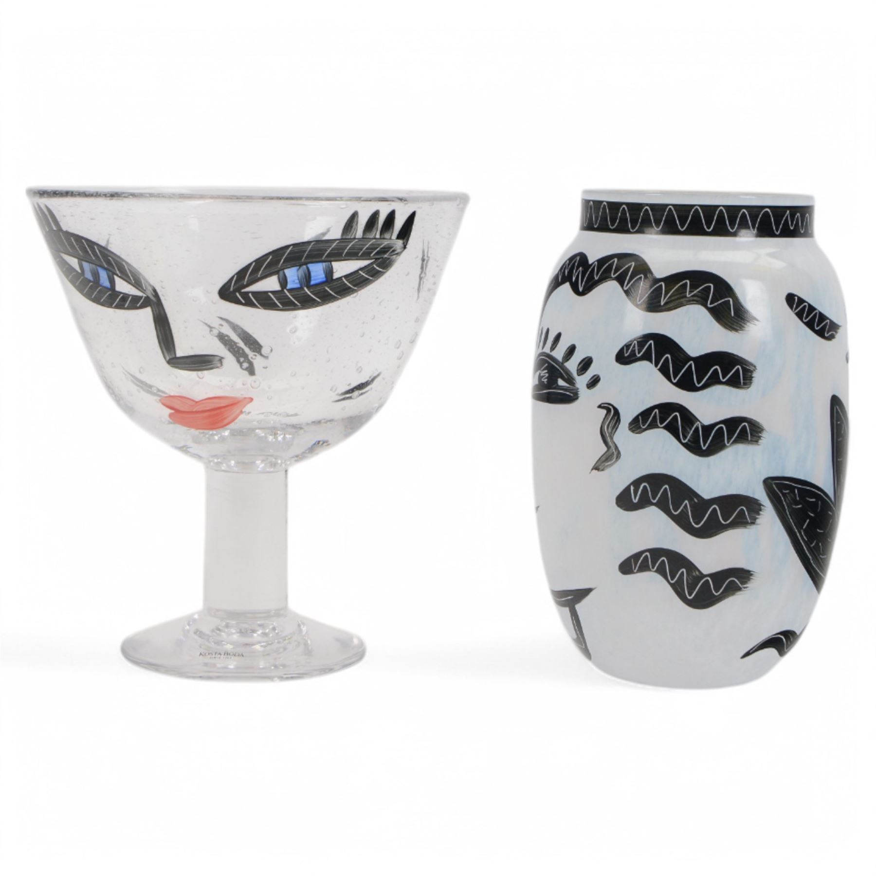 Kosta Boda Open Minds glass footed bowl, the clear glass bowl painted with female facial features, together with a Kosta Boda Caramba vase, of baluster form painted in black with a head in profile and a two headed beast on a white ground, both designed by Ulrica Hydman-Vallien, tallest H19.5cm
