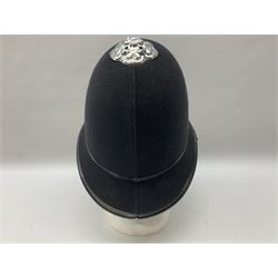 British Transport Police Custodian helmet with Queen's Crown plate; Hiatt & Co ebonised hardwood patrol truncheon; and pair of Hiatts 1960 hand-cuffs (3)