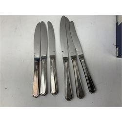 Four butter knives with hallmarked silver handles together with a Quantity of silver-plated cutlery stamped Ashberry and other stainless steel cutlery