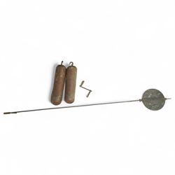 Mid 19th century- 8-day oak and mahogany longcase clock, with a carved swan necked pediment and crossbanding, break-arch hood door flanked by reeded pilasters, broad trunk with matching pilasters to the sides, short triple spire door with inlay and a and raised panel beneath, plinth with a conforming inlaid panel to the front, raised on backet feet, painted dial with floral spandrels and a rolling moon to the arch, broad Roman numerals, seconds dial, date aperture and stamped brass hands, dial pinned to a rack striking weight driven movement striking the hours on a bell. With weights and pendulum.