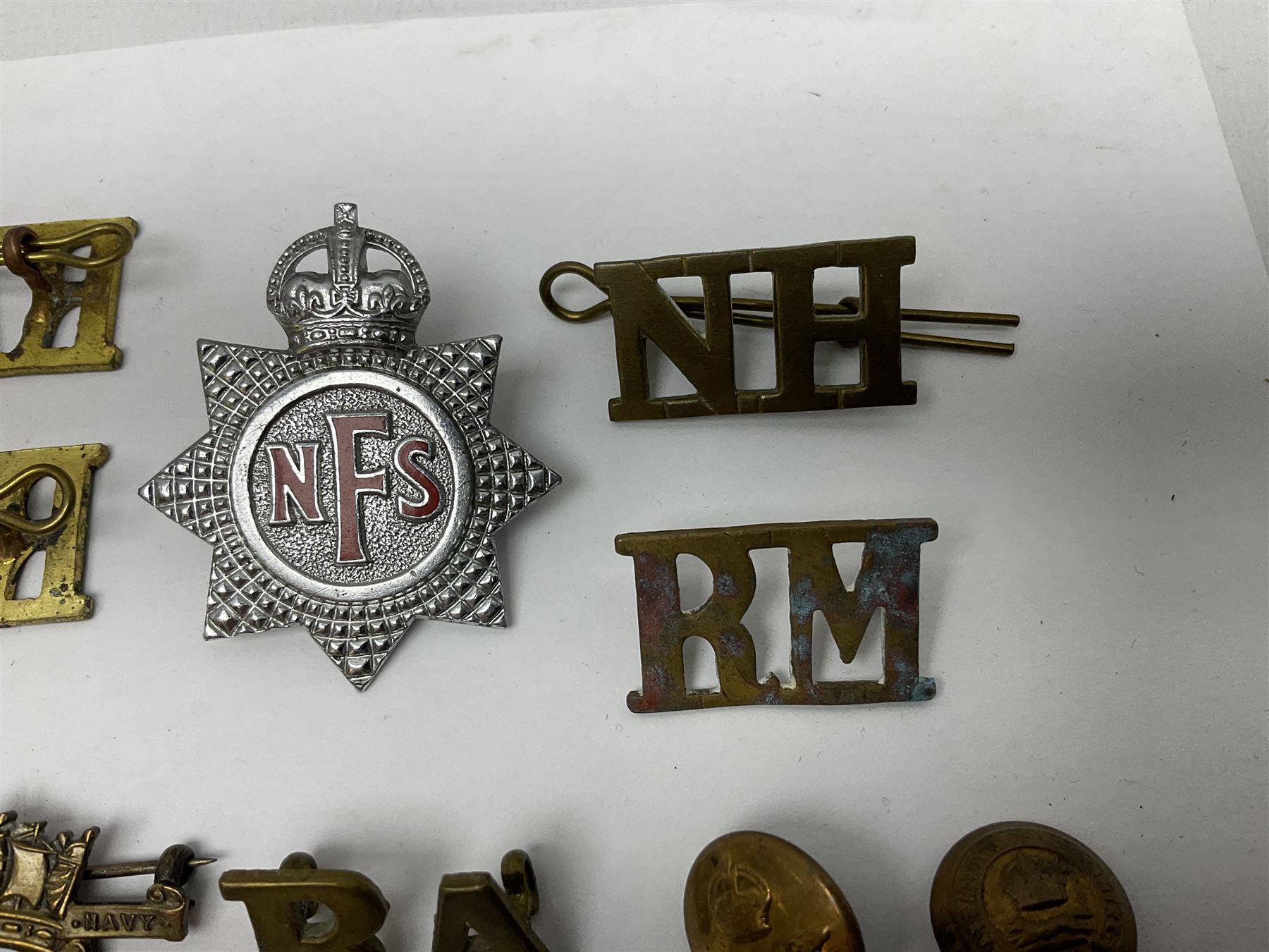 Two Services Rendered badges Nos.B23060 and B201341; two MSO BAOR (Mixed Services Organisation British Army of the Rhine) badges; small quantity of shoulder titles, lapel/sweetheart brooches, buttons and non-military related items