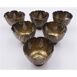 Set of six Ottoman Turkish silver zarfs or coffee cup holders, probably 19th century, the bowls with shaped rims and embossed and pierced decoration, upon stepped circular feet, D6cm H5cm