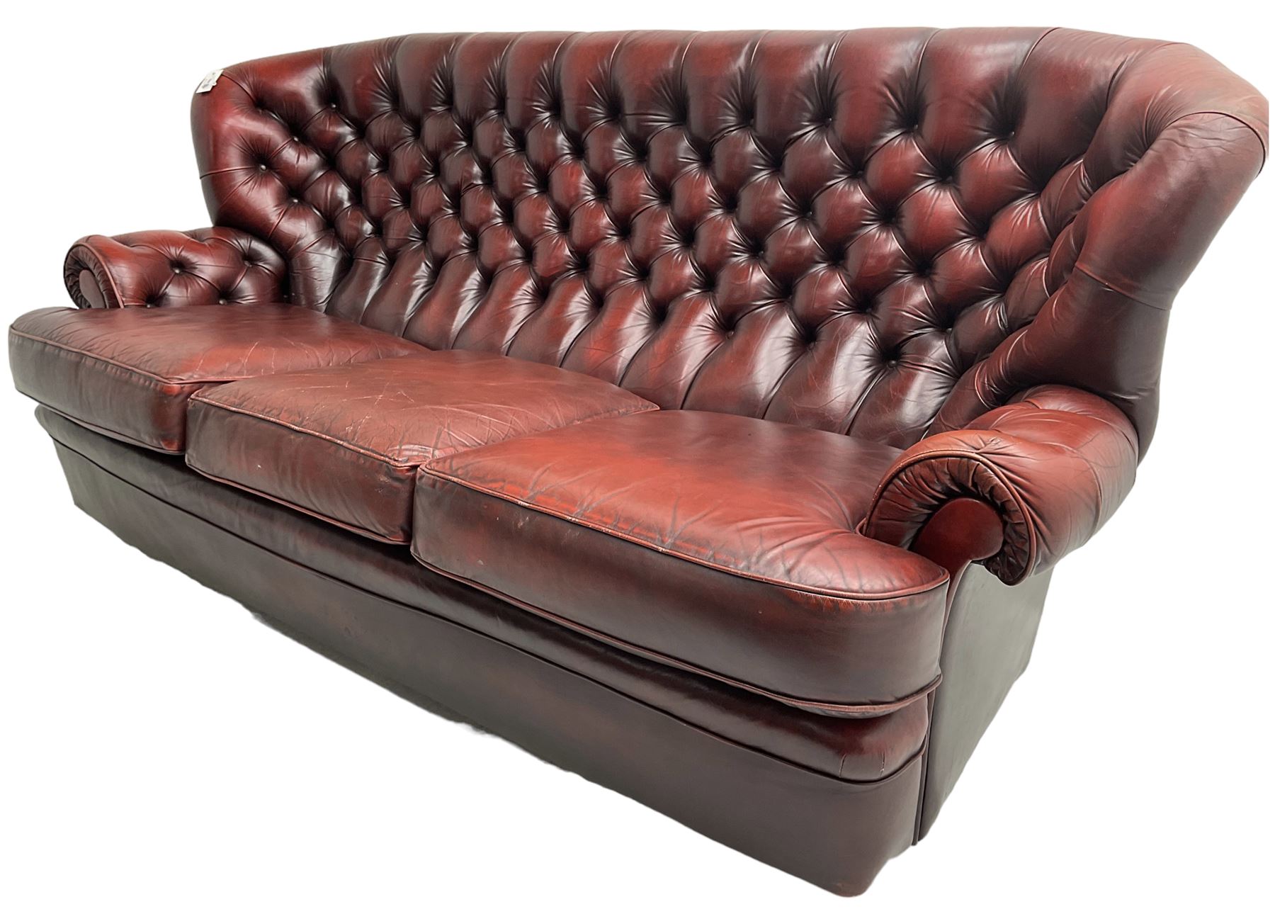 Wade - Georgian design three-seat sofa, high curved back over scrolled arms, upholstered in deep buttoned oxblood 'Pegasus' leather, on castors