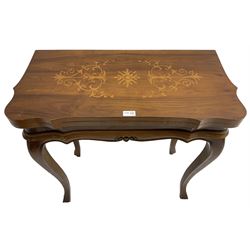 French design inlaid mahogany games table, sliding fold-over top with releasing mechanism to underside, decorated with scrolling foliate inlays and central chequerboard, raised on cabriole supports