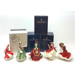 A group of five Royal Doulton figures, comprising Christmas Day 2000 HN4242, Christmas Day 2005 HN4723, Pretty Ladies Winter Elegance HN5109, Victorian Christmas N4675, and Christmas Celebration HN4721, four with boxes. (5). 