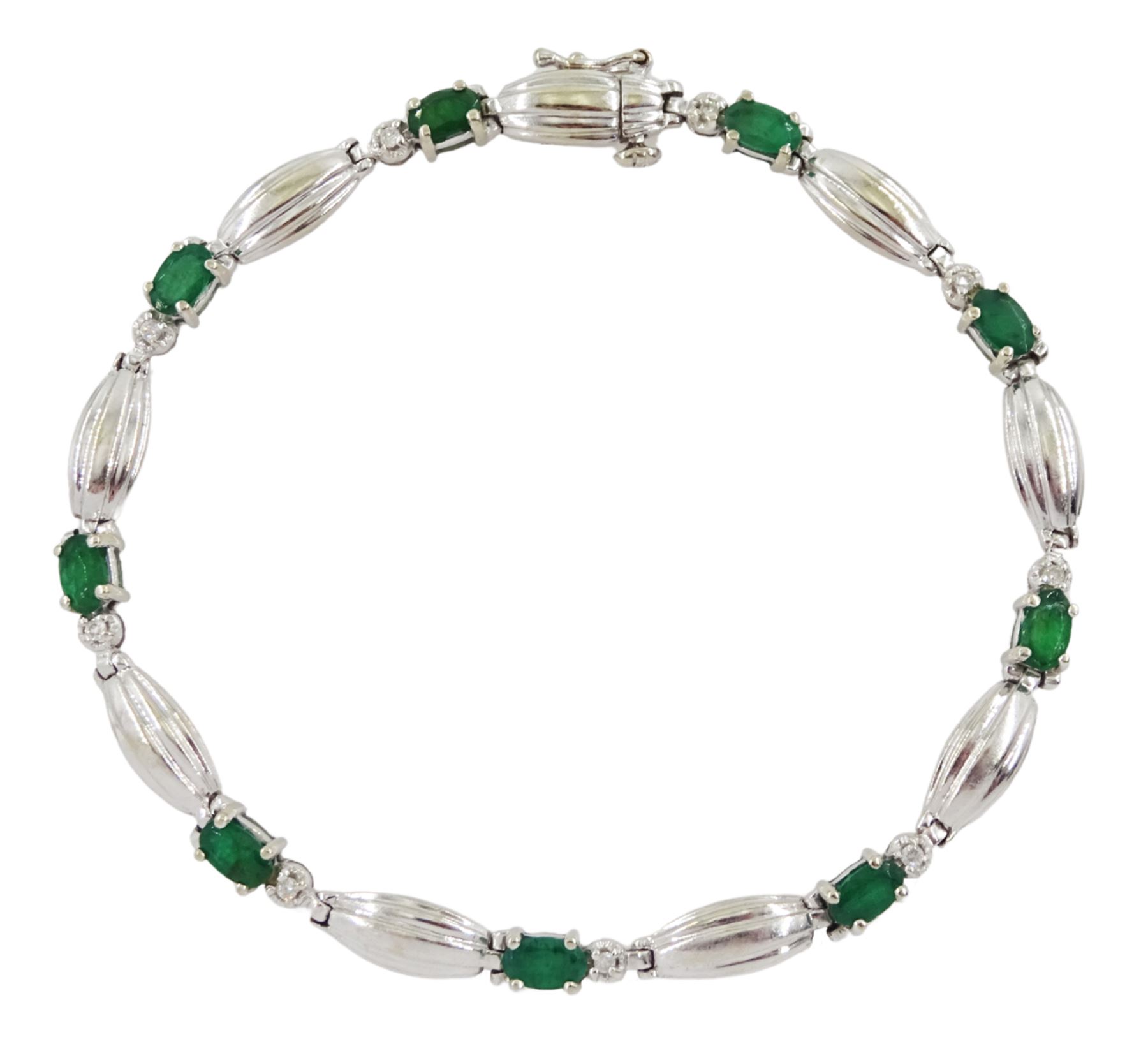 9ct white gold oval emerald and diamond link bracelet, hallmarked