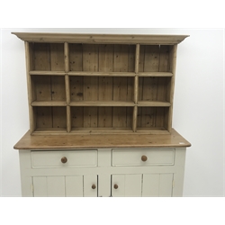  White painted and waxed pine dresser, two drawers and two cupboards, raised two heights plate rack, W141cm, H178cm, D48cm  