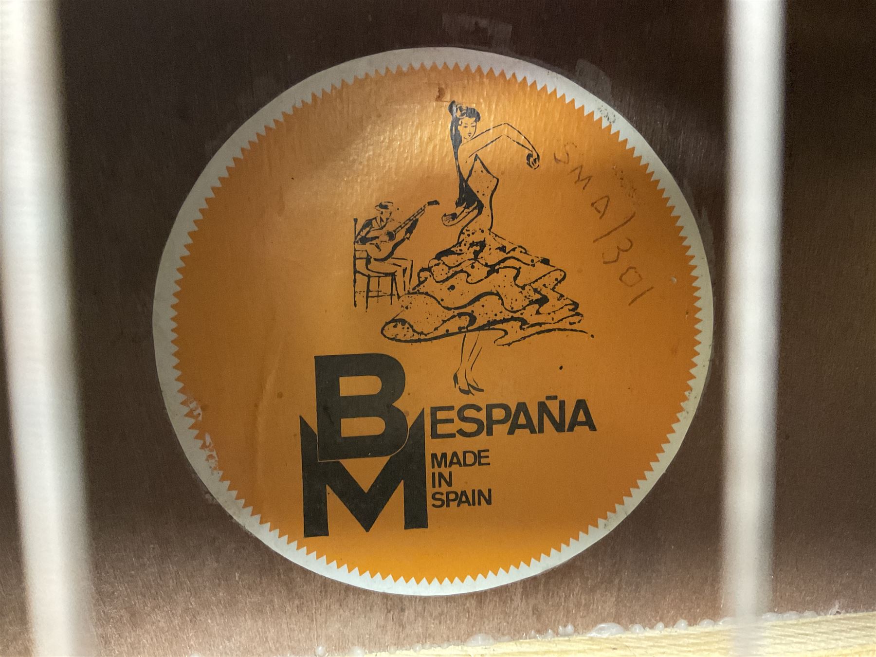 Spanish BM acoustic guitar with mahogany back and sides and spruce top L101cm; in cello carrying case; Roland foot pedal and two Yamaha foot pedals; tin D# organ pipe; folding music stand etc