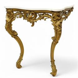 Late 19th to early 20th century giltwood and gesso console table with marble top, shaped white marble top, the base with pierced front decorated with shells and trailing leafy branches with flower heads, on cabriole supports with shell decorated knees, scrolled feet with acanthus leaf terminals 