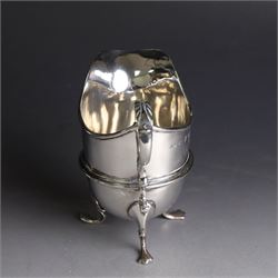 Late Victorian silver helmet shaped cream jug, with acanthus capped handle and upon three pad feet, hallmarked Birmingham 1898, maker's mark worn and indistinct, probably T Beardsmore, H10cm