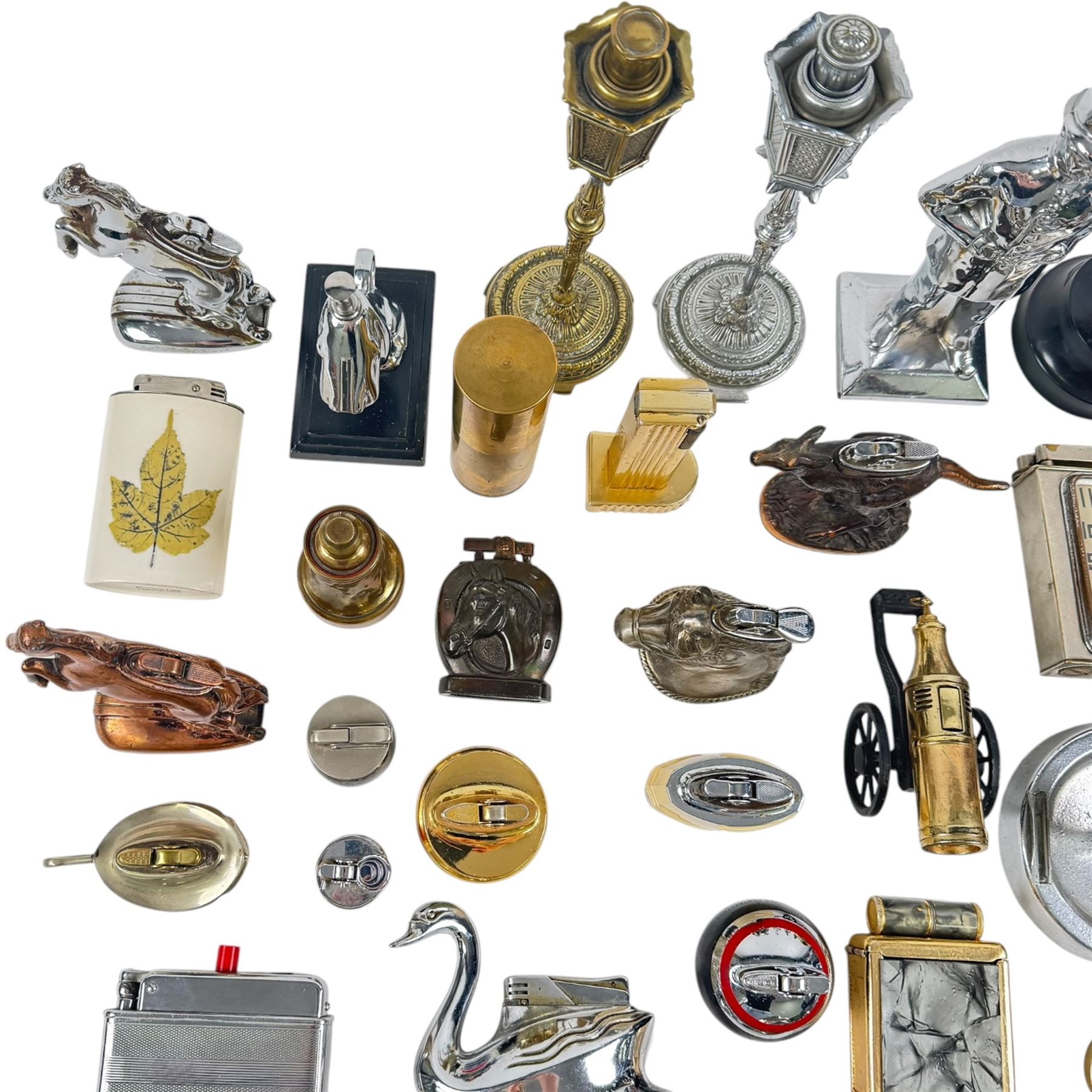 Collection of novelty lighters, including examples modelled as horse, swan, kiwi, bullet, lamppost etc 