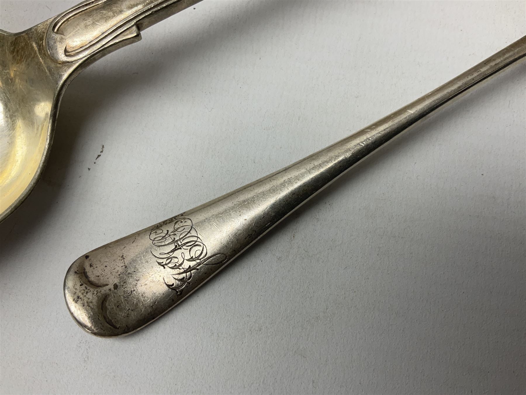 Edwardian silver dessert fork, and silver dessert spoon, hallmarked Sheffield 1905, and 1908, together with a mid 20th century coffee spoon, hallmarked Sheffield 1954, and a silver plated Kings pattern table spoon, approximate total silver weight 108 grams