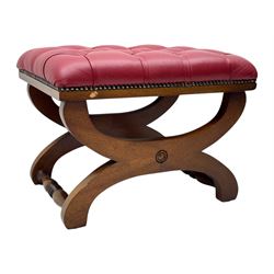 Kingsgate - contemporary 'Suffolk' wingback armchair and matching stool, upholstered in red leather with deep button tufting and brass stud trim, raised on square section supports 
