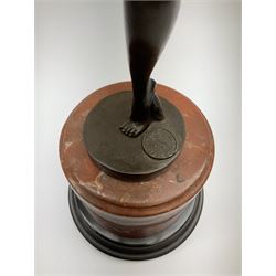 An Art Deco style bronze after D Alonzo, modelled as a dancer, with impressed mark and foundry mark, raised upon a cylindrical marble base, overall H47.5cm. 