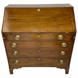 George III mahogany bureau, the fall-front banded and with boxwood stringing, enclosing fitted interior with pigeonholes and drawers surrounding a central cupboard with inlaid shell motif, the base with four graduating cock-beaded drawers, each with pressed brass handle plates with central lion masks and ivory escutcheons, on shaped bracket feet
This item has been registered for sale under Section 10 of the APHA Ivory Act