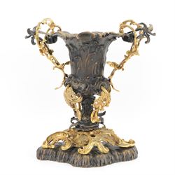 After Henry Dasson (1825-1896): large French gilt bronze urn, the body of typical form and cast with C scrolls, with twin curved gilt foliate handles detailed with birds, upon a scrolling foot, and naturalistically cast base, impressed HENRY DASSON to foot, H50.5cm W48cm