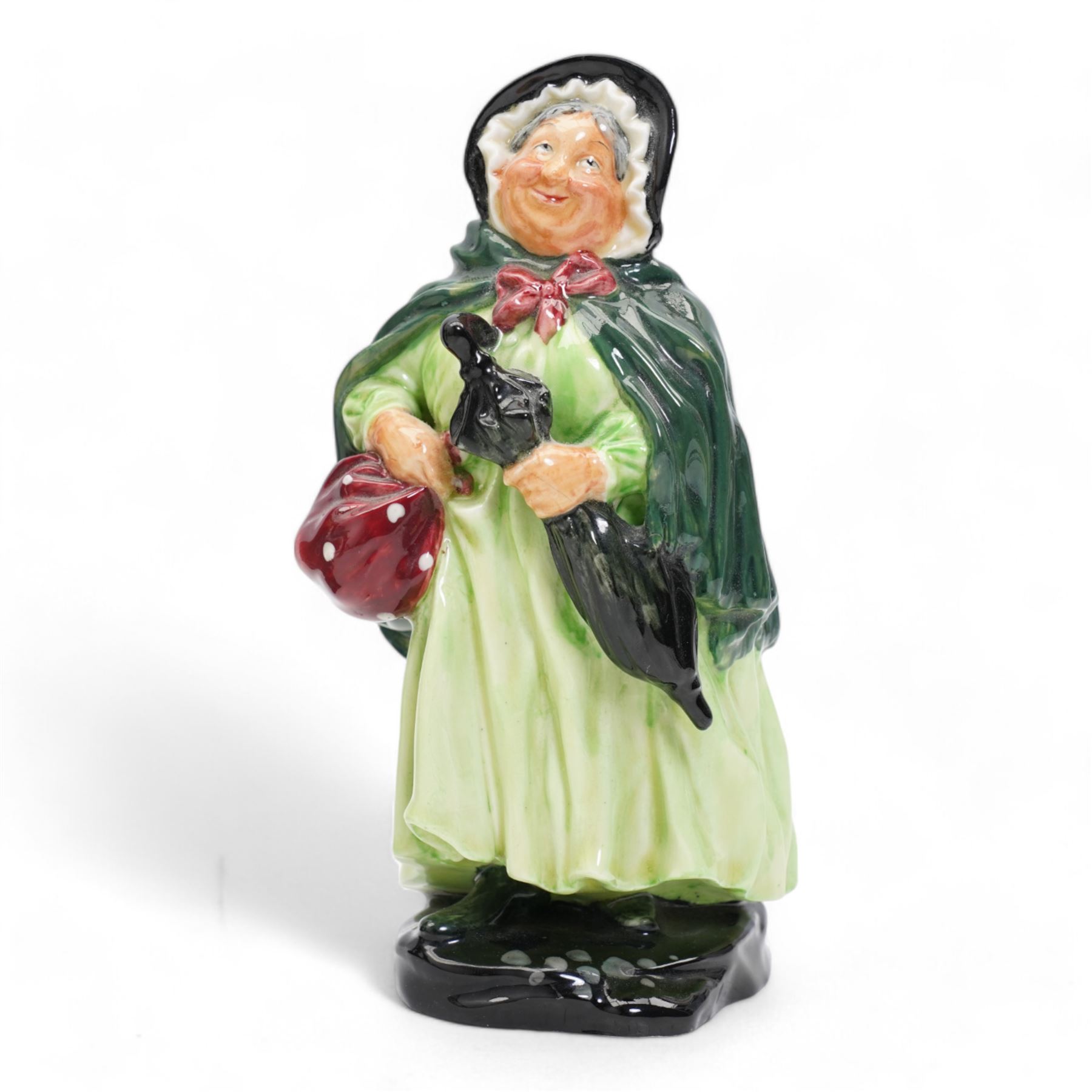 Three Royal Doulton figures comprising 'Sairey Gamp' HN1896, 'The Jester' HN2016 and  'Blue Beard' HN2105 (3)