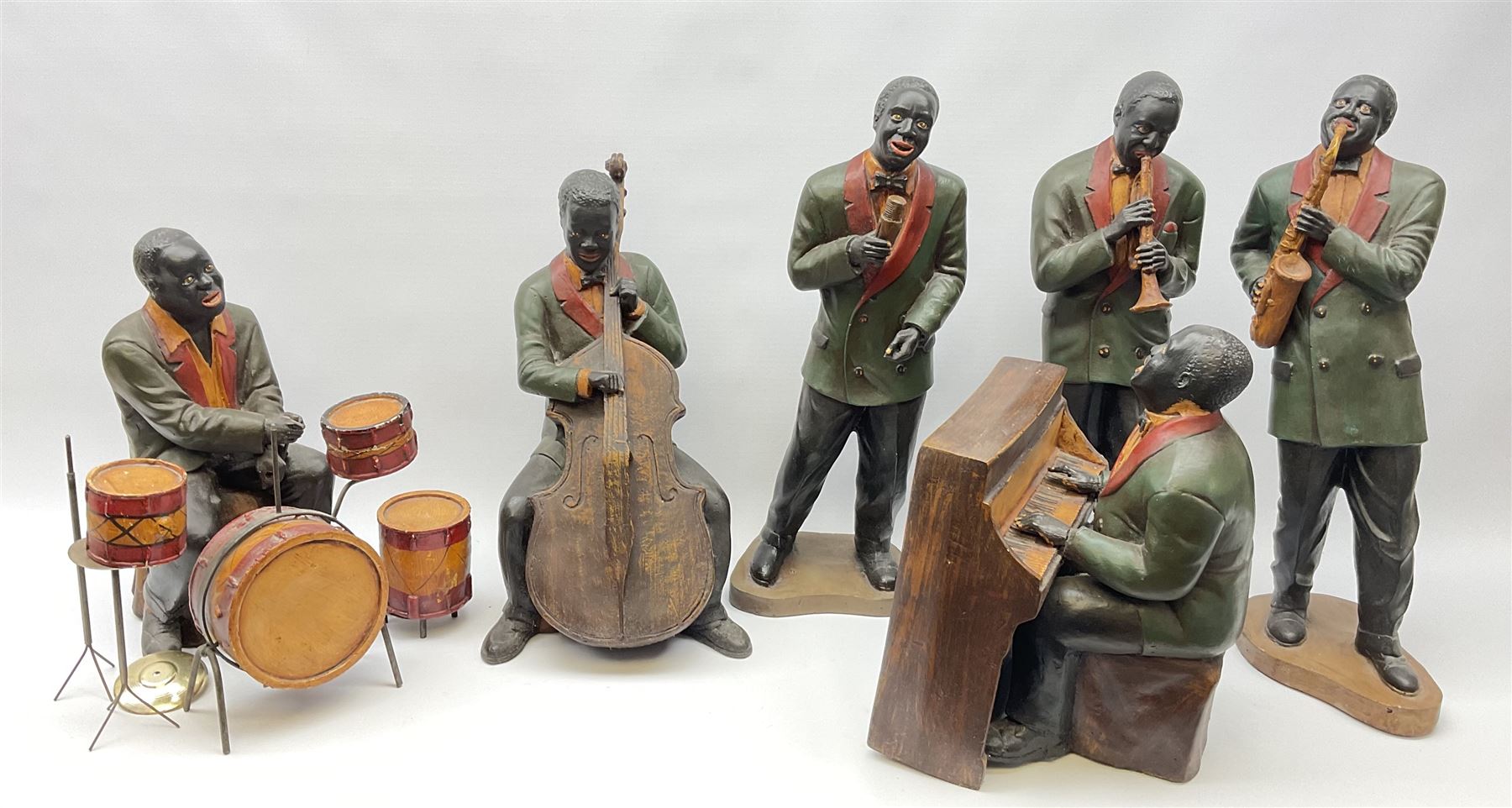 A group of six large composite Jazz Band figures, to include pianist