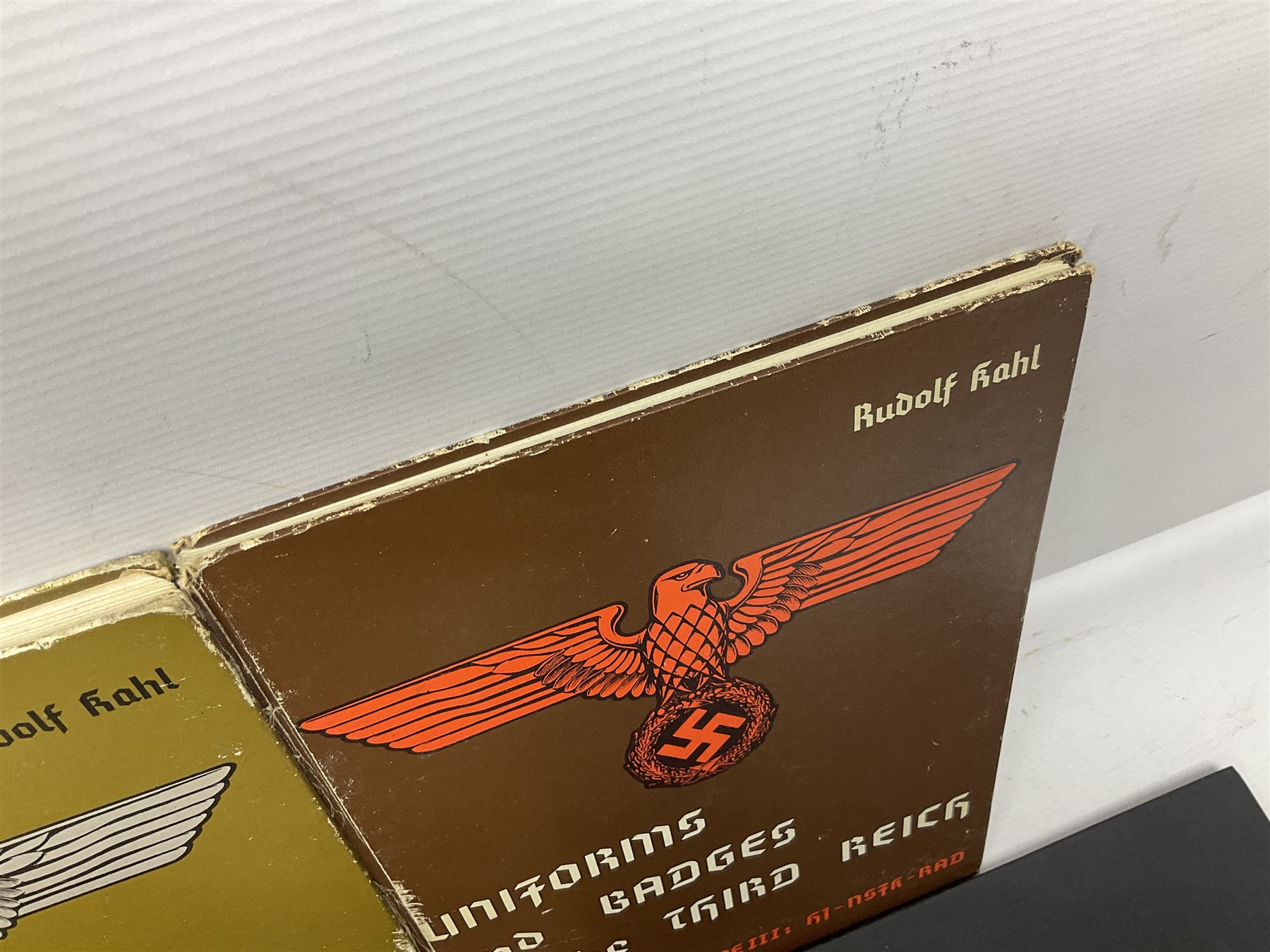 Military Collectors Service: set of three books on WWII German uniforms and badges; and Mollo Andrew: Uniforms of the SS. Volumes 1,4,5,6 & 7 (8)