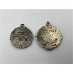 Ten early 20th century silver cartouche fobs, to include a Yorkshire Rose example, all hallmarked with various dates and makers
