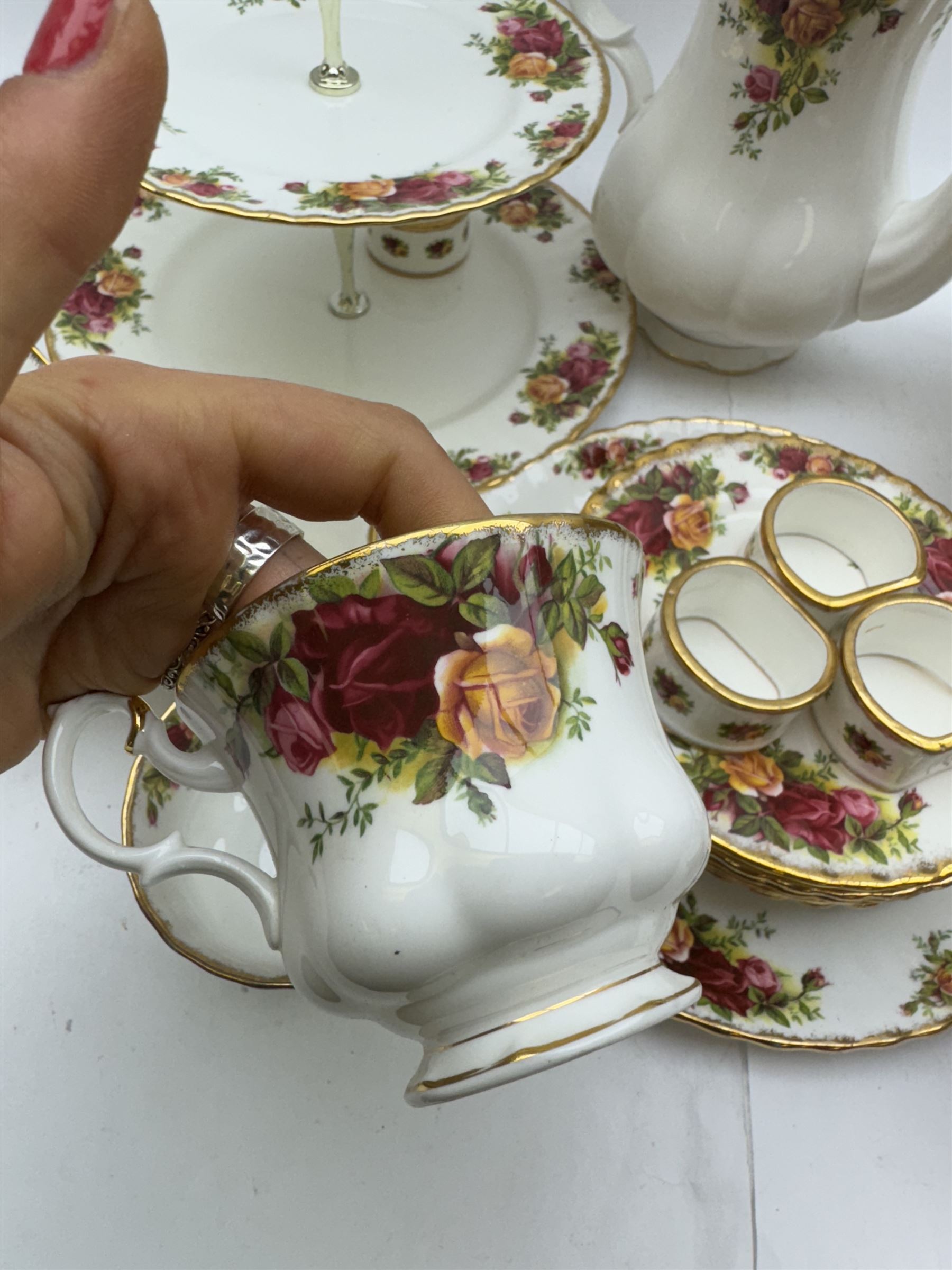 Royal Albert Old Country Roses pattern tea wares, comprising coffee pot, jug and sugar bowl, cake stands, napkin rings, teacups and saucers, side plates, dessert plates, small plates, all with printed marks beneath