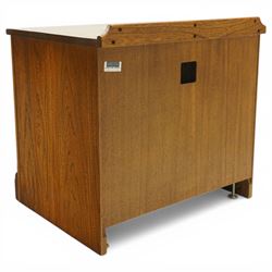 Ercol - elm media cabinet of small proportions, fitted with glazed door enclosing single shelf, on skirted base
