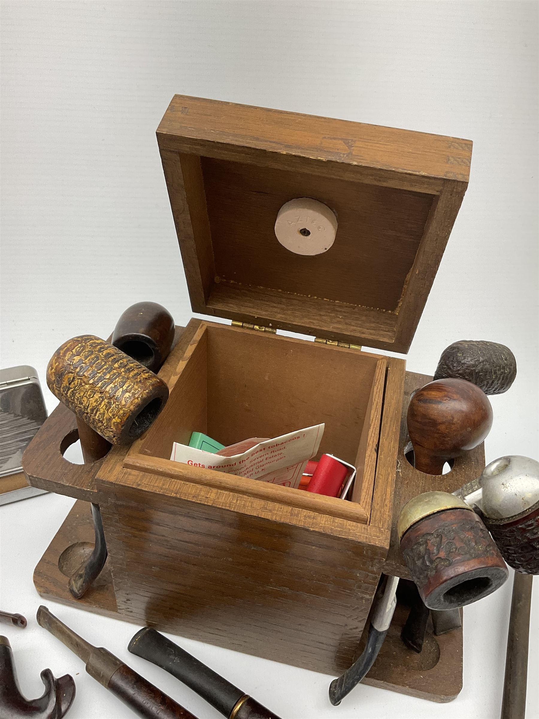 Vintage pipes and smoking related items including 'Falcon' and 'Dr Grabow' pipes, small wooden pipe rack/box and other related items