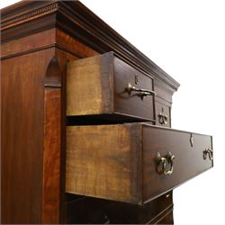 Late 18th century George III mahogany secretaire chest-on-chest, dentil cornice over banded frieze, the top section fitted with three short cock-beaded drawers over three long flanked by chamfered uprights, the base with initial secretaire drawer - fall-front enclosing fitted interior with button-release, correspondence drawers and pigeonholes, over two long drawers with brass swan-neck handles and bracket feet