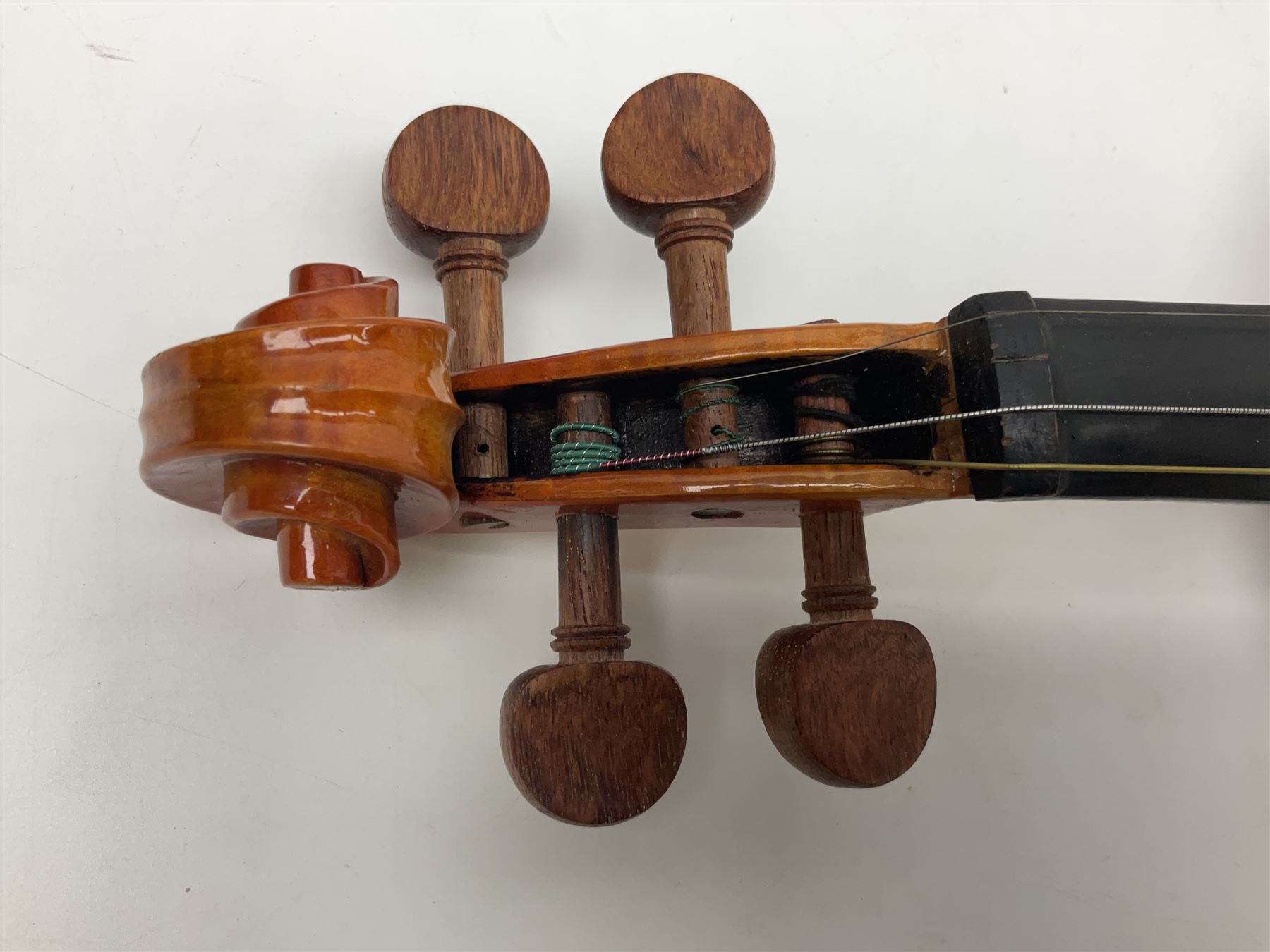 Three Stentor Student violins - three-quarter size with 33cm two-piece back; and two quarter size each with 28cm two-piece back; each in carrying case with bow (3)