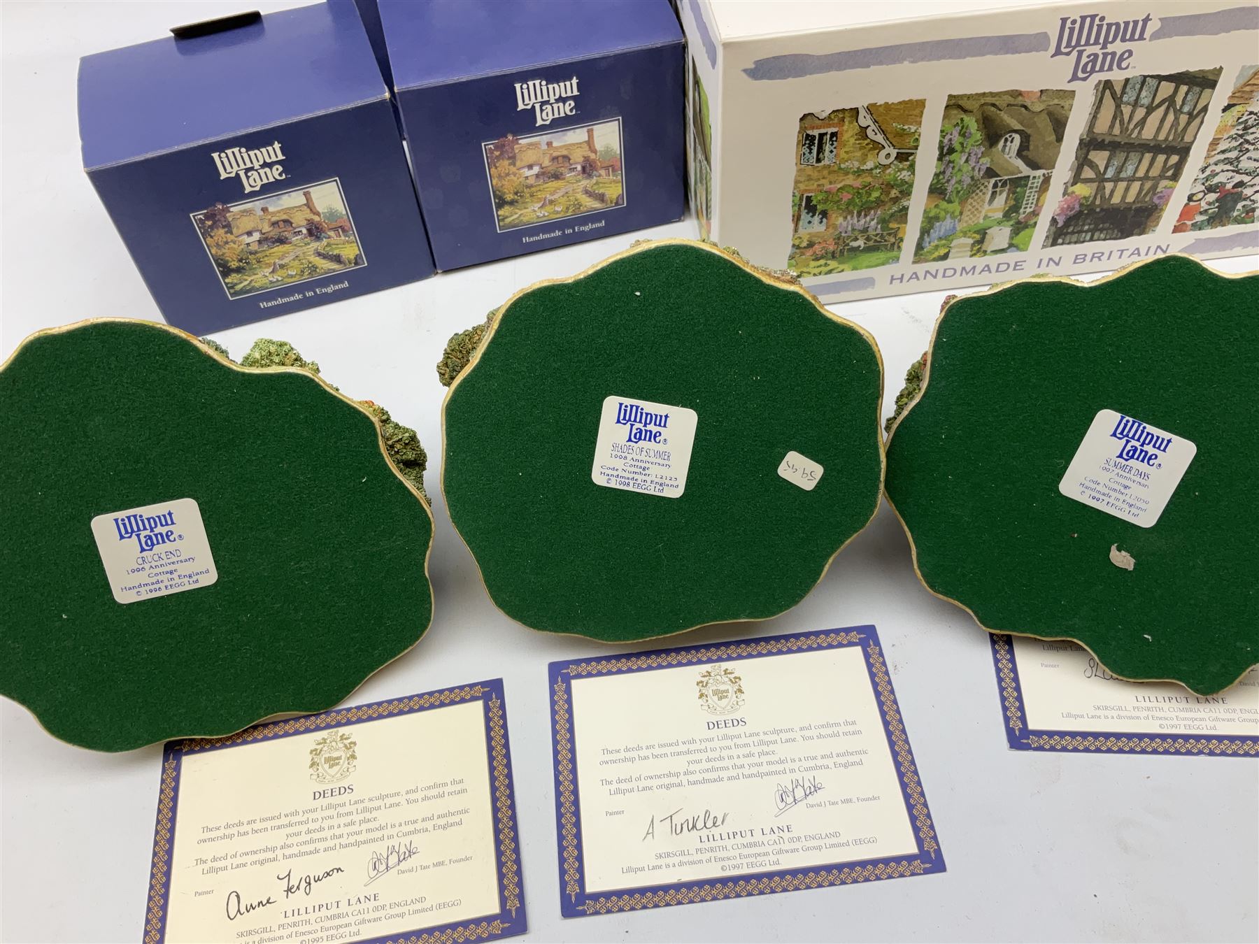 Eight Lilliput Lane models, including Gertrude's garden, Cruck End, Honeysuckle cottage, The Pottery, Huddersfield Railway Station, The Magpie Cafe, Amberly Rose, Summer Days and Shades of Summer, all boxed with deeds