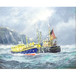  Jack Rigg (British 1927-): 'Helpmates' - Whitby Lifeboat alongside a Berwick Fishing Boat, oil on canvas signed and dated 2008, titled verso  50cm x 59cm  DDS - Artist's resale rights may apply to this lot  