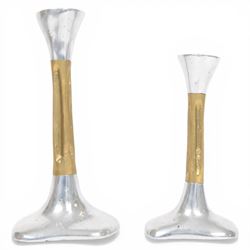 Set of David Marshall graduating candlesticks, brass and polished aluminium, makers mark impressed to stem, largest H26cm