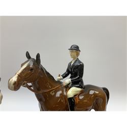 Beswick Hunting Group, comprising huntswoman on bay horse, model no 1730, huntsman on bay horse, model no 1501, together with standing fox, model no 1440 and twelve fox hounds, all with printed marks beneath