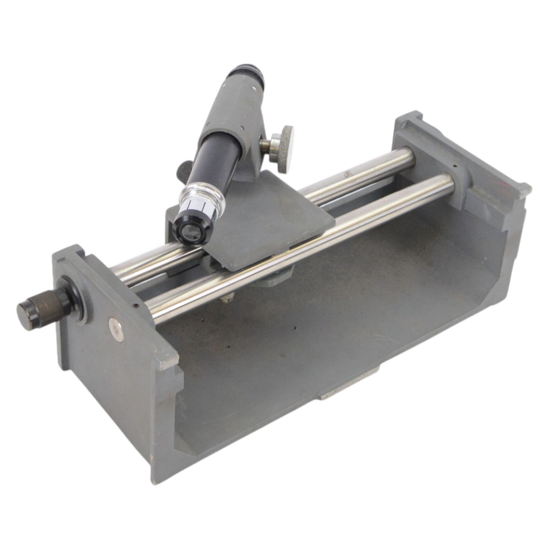 Three microscopes, including Griffin Student Vernier Microscope, Vickers Instruments binocular microscope with Leitz Wetzlar Periplan 10x lenses, and a Carl Zeiss Jena binocular microscope in a wooden Olympus Tokyo box