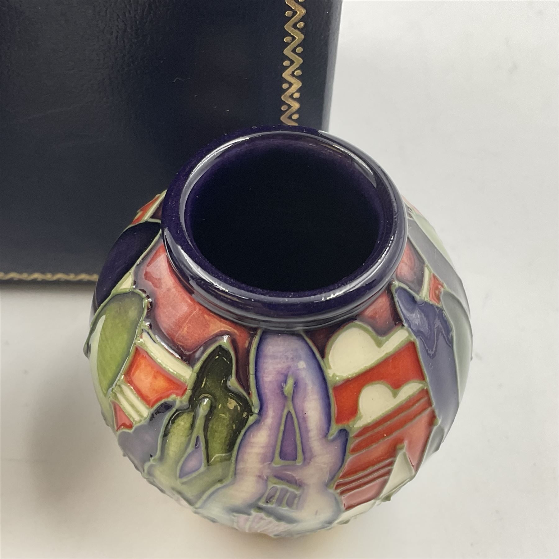 Two miniature Moorcroft vases, one decorated in the Lodge Hill pattern, circa 2007, H6cm,  and the other decorated in Made in Burslem circa 2011, H6cm  