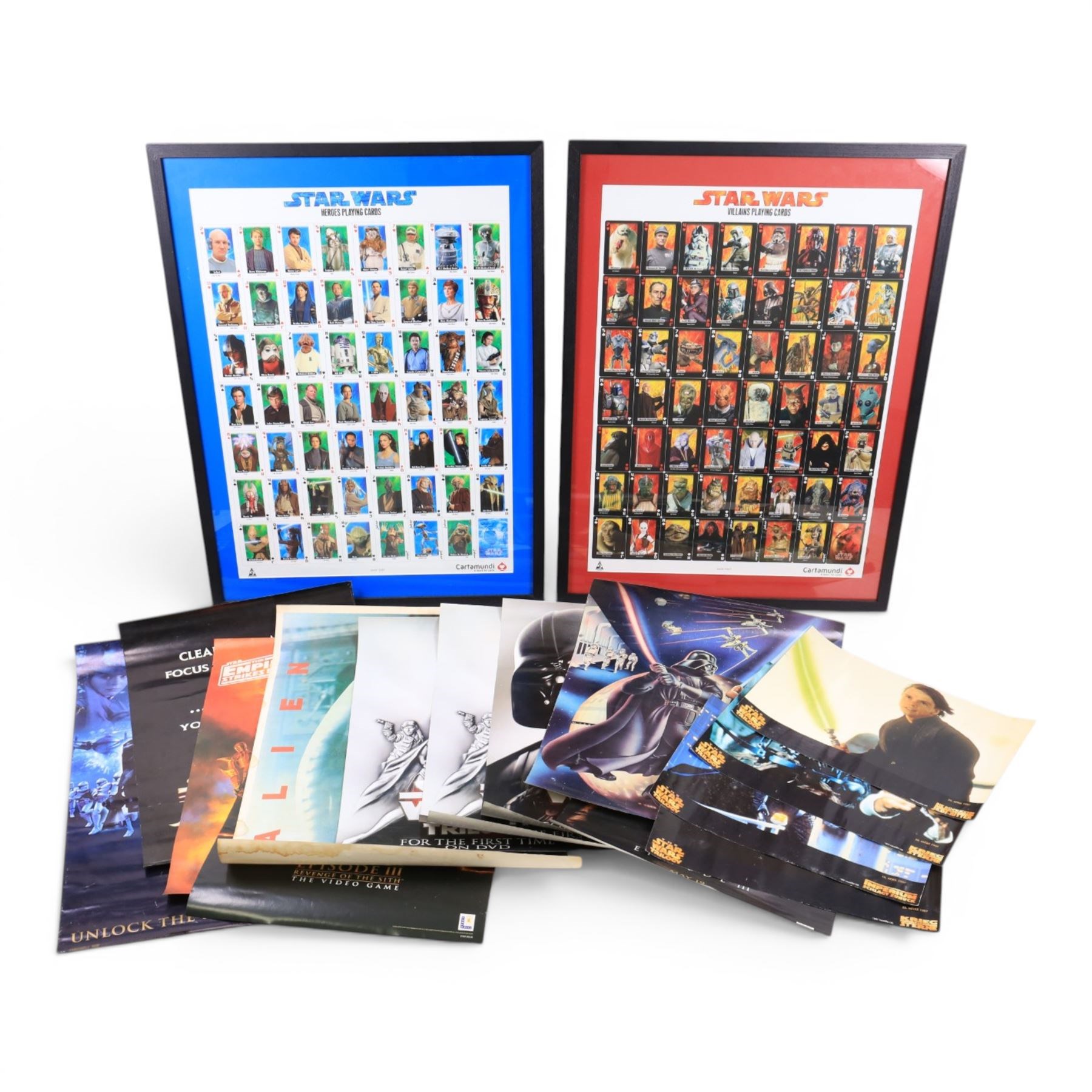 Star Wars cardboard advertising signs and a collection of posters, including life-size cardboard cut of Kylo-Ren, life size Force Awakens First Order Storm Trooper, Star Wars Trilogy DVD display stand, Storm Trooper Door Poster, 1970s/80s posters, three special edition film door scroll posters, etc