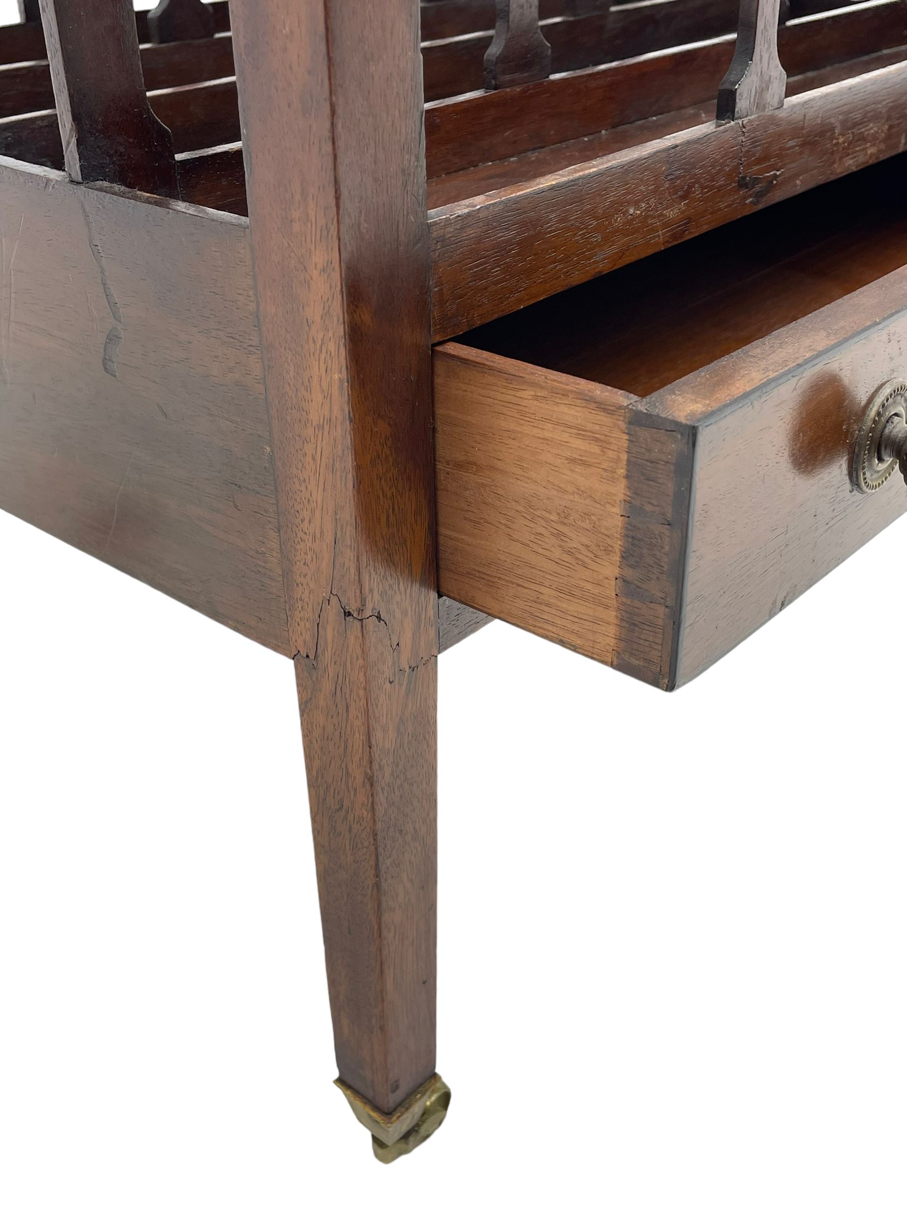 Georgian design mahogany Canterbury, four divisions with dished upper rails, the central rail pierced with handle, fitted with single drawer, on square supports with brass cups and castors 