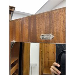 Waring and Gillow - early to mid 20th century figured walnut Gentleman’s wardrobe, two doors enclosing various compartment, mirror, drawers and hanging space, labelled 