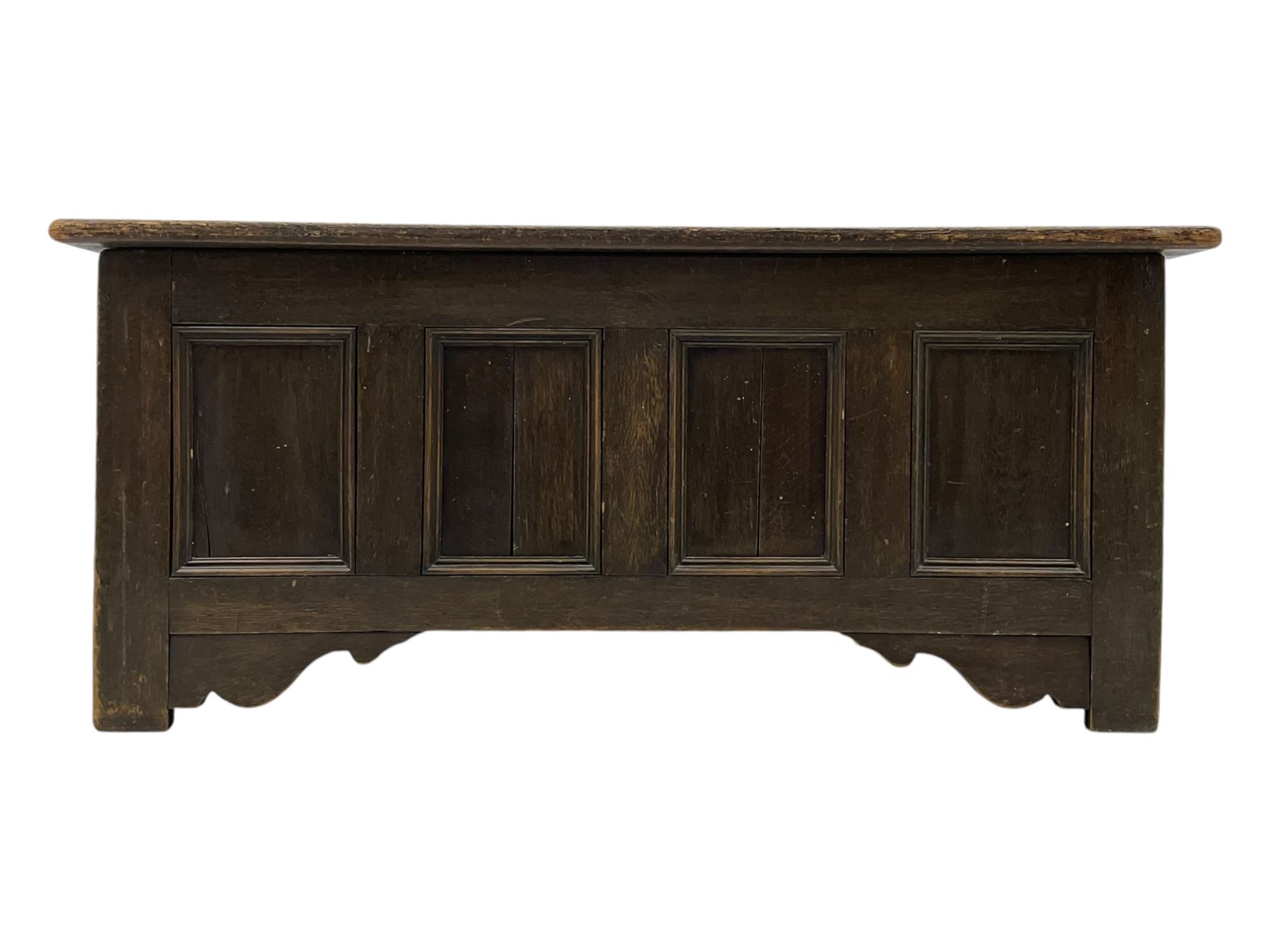 18th century design oak coffer, four panel hinged lid over four panel front, panelled sides, on stile supports with shaped brackets 