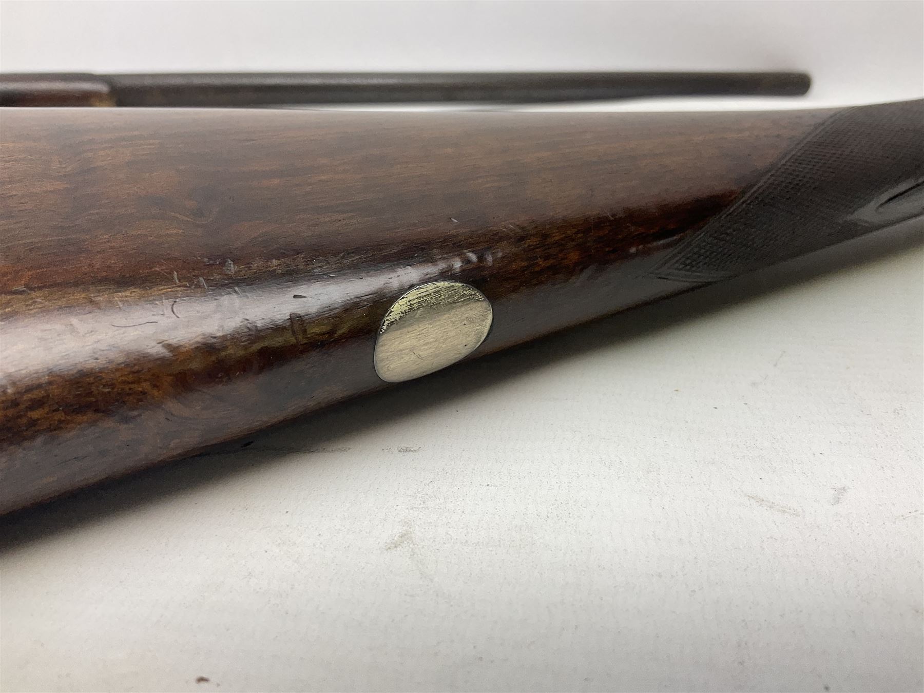 Smith Midgley Bradford 12-bore side-by-side double barrel side-lock ejector shotgun with 71cm barrels, engraved action with patented top lever, ivy leaf fences and top safety, walnut stock with chequered grip and fore-end, serial no.62409 to barrels and 1481 to action, L115cm overall SHOTGUN CERTIFICATE REQUIRED