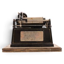 Early 20th century Edison GEM phonograph, in oak case, serial number G72256, with brass and black horn and a collection of wax cylinders