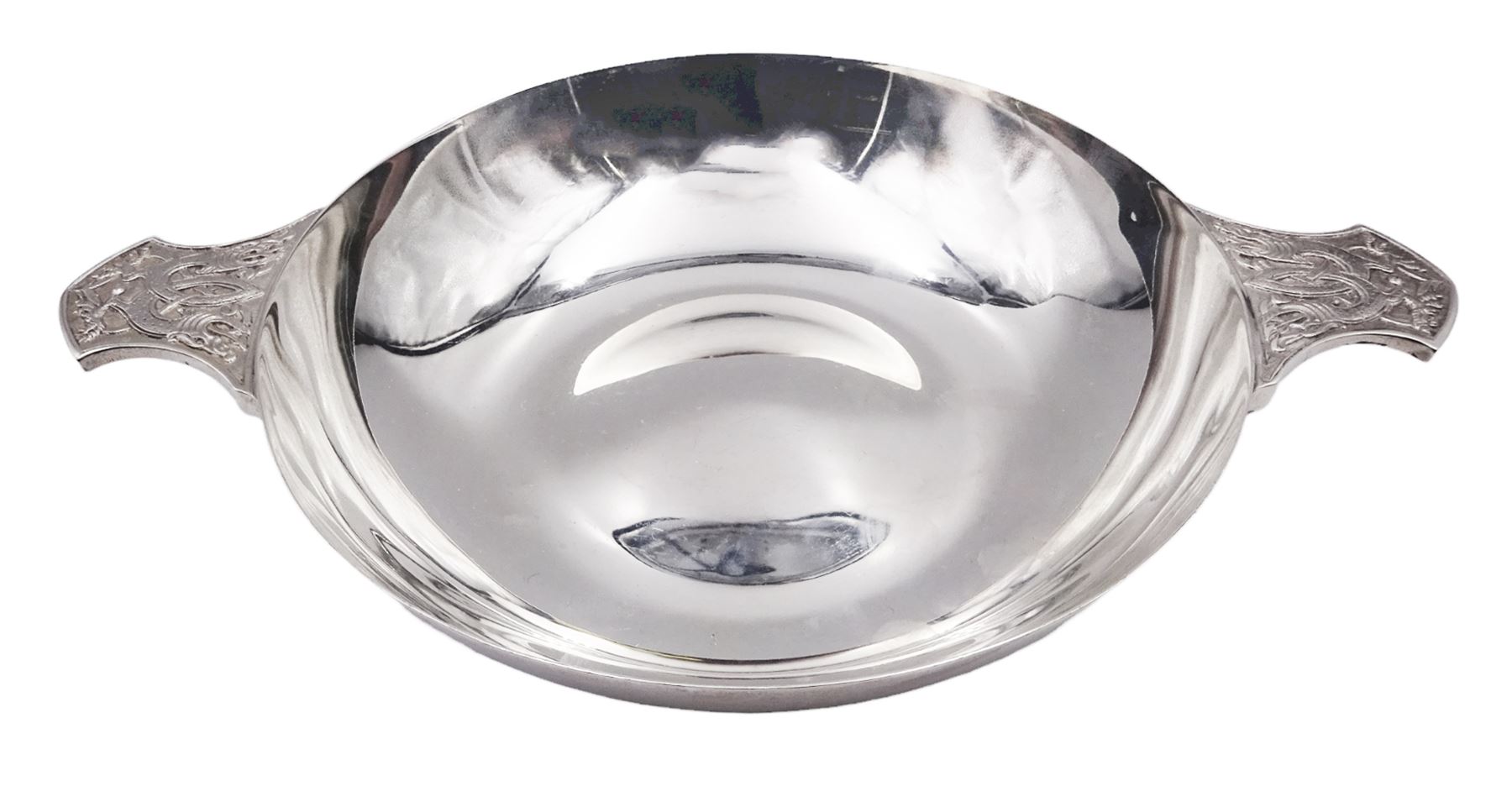 Large modern silver Quaich, of circular form with twin handles cast with stylised dragon motifs, hallmarked Birmingham 2009, makers mark W&W, D18cm, approximate weight 11.14 ozt (346.8 grams)