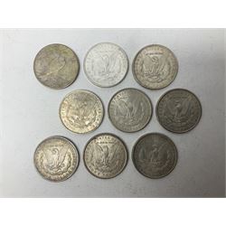 Eight United States of America silver Morgan dollar coins, dated 1882, 1884 O, 1884, 1885, two 1886, 1889, 1890 and a 1925 peace dollar