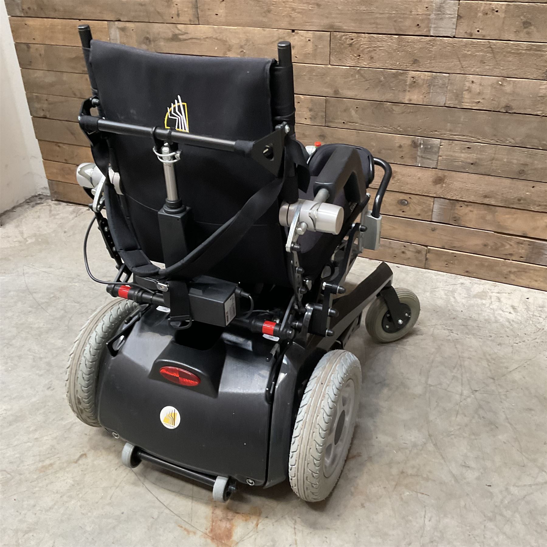 Permobil LSA Lifestand seated and standing wheelchair